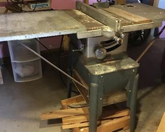 Craftsman table saw on casters. 