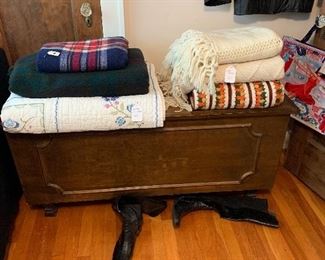 Cedar closet with quilts wool throws and knitted afghans   