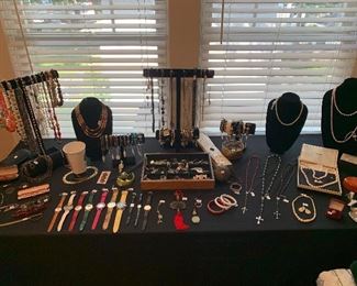 A table full of nice costume jewelry