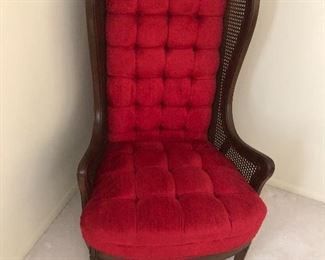 Antique red fabric wingback chair 