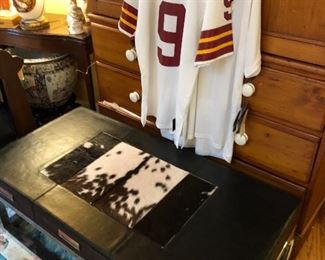 Leather and cowhide coffee table, signed Redskins Jerseys