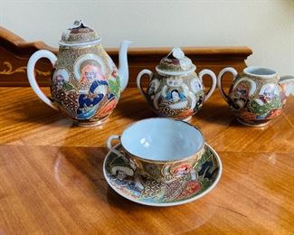 ITEM 61: SATSUMA JAPANESE TEA SET: Teapot, Sugarpot, Creamer, Cup & Saucer. 
