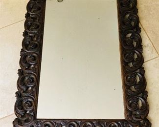 ITEM 32: ANTIQUE ARTISAN HAND CARVED FRAME MIRROR. Dimensions: 25"W x 35"H (including the frame); 16.5"W x 27"H (only mirror)