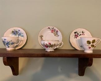 Assorted tea cups and saucer