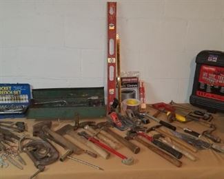 Large selection of tools in basement and garage.
