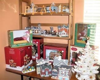 Lots of Department 56 and Christmas Village Holiday Buildings...many in the original boxes...located all throughout the house.....I'm dreaming of a White Holland Mold Christmas Tree.