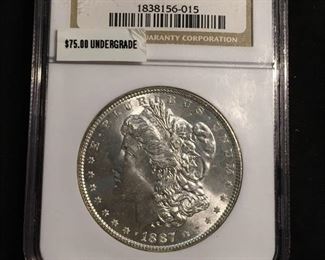 1887-P United States Morgan Silver Dollar - NGC Graded MS 64