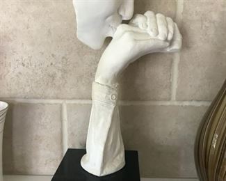 Plaster face and hand art