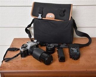 40. CANON AE1 With Accessories