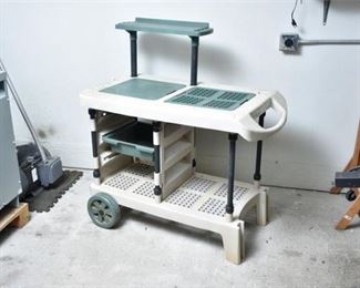 94. Plastic Rolling Work Station