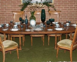 Thomasville Furniture Company Mid-Century (1965) Dinning Room Table with Federal Style Cane Chairs (6) Side Chairs (2) Captain Chairs Oval table (66"x 45") w/ (2) leaves 18" ea. Shown with both leaves. (66” x 71”)