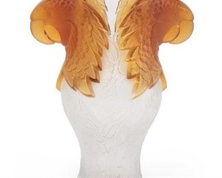 4
A Lalique "Macaw" Amber And Frosted Art Glass Vase
Fourth-quarter 20th Century
Acid-etched signature and edition number: Lalique (R) France / 39/99
The vase with amber double parrot-head handles and molded parrot feathers throughout the body
13" H x 9.5" W x 6.5" D
Estimate: $2,000 - $3,000