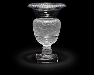 16
A Lalique "Versailles" Art Glass Urn
Fourth-quarter 20th Century
Acid-etched signature and edition to foot: Lalique (R) France / 44
Originally designed by Rene Lalique in 1939, the classic urn shape inspired by the Medici vases with frosted floral motif
14" H x 9.5" Dia.
Estimate: $1,000 - $1,500