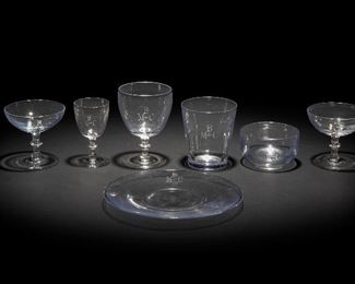 24
An Assembled Group Of Steuben Glassware
20th Century
All but two personalized
Comprising 12 plates (8.375" Dia.), 12 fingerbowls (2.5" H x 4" Dia.), 12 water goblets (5.25" H x 3.75" Dia.), 12 stemless goblets (4.25" H x 3.875" Dia.), 12 cordial glasses (4.375" H x 2.5" Dia.), 6 sherbets (3.75" H x 4.25" Dia.), and 6 flat champagne glasses (3.75" H x 4" Dia.), 72 pieces
Estimate: $1,200 - $1,800