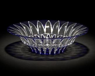 33
A Baccarat "Coupe Arizona" Dish
1999, France
Acid etched to base: Baccarat; Further numbered: 8/24
The blue crystal dish cut to clear
3.75" H x 12" Dia.
Estimate: $2,000 - $3,000