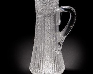 36
An American Brilliant-Cut Glass Pitcher
Late-19th/early-20th Century
Apparently unmarked
The tall heavy pitcher with sawtooth rim and curved faceted handle
14" H x 8" W x 5.875" D
Estimate: $600 - $800