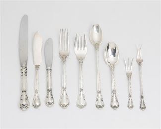 38
A Gorham "Chantilly" Sterling Silver Flatware Service
20th century
Most stamped for Gorham; Further stamped for Sterling; Some items further stamped: Chantilly; Four items stamped for various makers
Comprising 86 Gorham pieces designed in 1895 by William C. Codman: 12 hollow-handled dinner knives (8.875"), a master butter spoon (6.75"), 8 butter spreaders (6.125"), 12 dinner forks (7"), 12 salad/dessert forks (6.5"), 8 iced tea spoons (7.625"), 20 teaspoons (5.875"), a two-piece carving set (knife 10.125"), a pie/cake server (10.5"), a serving fork (8.5"), 3 serving spoons (8.5"), a gravy ladle (6.5"), a small jelly server (6.125"), a shell sugar spoon (6"), a bon bon spoon (4.625"), a cocktail fork (5.75"), a lemon fork (4.375"); an S. Kirk & Sons Repousse bon bon spoon (5.125"), a Rogers Bros. silver plate bon bon spoon (6"), and 2 Irish-made demitasse spoons (4.375"), 90 pieces
Weighable sterling: 75.495 oz. troy approximately
Estimate: $2,000 - $3,000