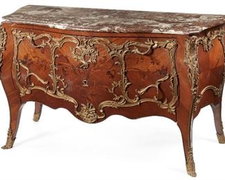 42
A Louis XV-Style Two-Drawer Commode
Late-19th Century
The parquetry body with floral motifs, marble top, and gilt bronze mounts
36" H x 54" W x 23" D
Estimate: $3,000 - $5,000