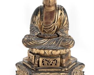 58
A Japanese Buddha On Lotus Base
Late-19th Century
The carved and gilt boxwood meditation Buddha sculpture in double-lotus pose
12" H x 9" W x 7.25" D
Estimate: $800 - $1,200
