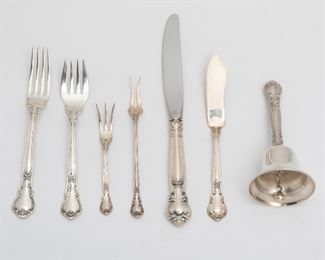 83
A Gorham "Chantilly" Sterling Silver Flatware Service
20th Century
Each stamped for Gorham; Sterling further stamped for Gorham / Sterling
Designed 1895 by William C. Codman, comprising 12 hollow-handled dinner knives (9.25"), 12 hollow-handled knives (8.875"), 1 master butter knife (6.875"), 12 dinner forks (7.5"), 12 forks (7"), 18 salad/dessert forks (6.5"), 4 iced tea spoons (7.5"), 17 round-bowl soup spoons (6.25"), 32 teaspoons (5.75"), 1 two-piece carving set (knife 11.25"), 1 cake breaker (10.75"), 4 serving spoons (8.5"), 1 large pierced spoon (8.375"), 1 gold-wash berry/casserole shell spoon (8.75"), 3 sugar shell spoons (6"), 2 gravy ladles (6.75"), 1 bon bon spoon (4.625"), 1 hors d'oeurves fork (5.75"), 1 long-handled olive fork (5.5"), 1 lemon fork (4.375"), 1 dinner bell (5.25"), and 17 salt spoons (2.75") together with an assembled set of 12 individual glass salt cellars, 168 pieces
Weighable sterling: 141.5 oz. troy approximately
Estimate: $3,000 - $5,000