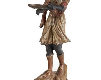 98
A Cast Iron Moorish Figure
Late-19th Century
The painted standing figure holding a later added dish on rock-formed base with decorative earrings and shoe-elements
60" H x 20" W x 30" D
Estimate: $2,000 - $3,000