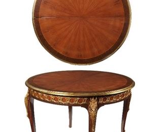 109
A Louis XV-Style Extendable Small Dining Table
Late-19th/early-20th Century
The round table with brass mounts to the rim, decorating the apron and legs with an extendable panel
Extended: 30.5" H x 63" W x 48" D; Closed: 30.5" H x 48" Dia.
Estimate: $3,000 - $5,000