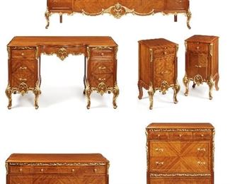 112
An American Bedroom Set In The French Style
Circa 1920's
Comprising a bed, two nightstands, a vanity, a tall dresser, a low dresser and a mirror each with acanthus leaf twist handles and gilt mounts, 7 pieces
Bed: 49" H x 82" W x 81" D
Estimate: $2,000 - $3,000