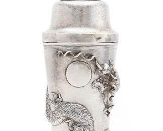 122
A Chinese Silver Cocktail Shaker
First quarter 20th century
Stamped: 85; Further stamped with two unidentified marks
The shaker featuring a dragon with applied, raised whiskers and scales
12.085 oz. troy approximately
Estimate: $600 - $900