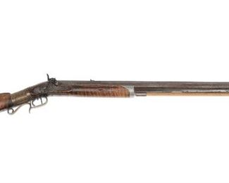 132
An American Percussion Atkins Long Rifle
19th Century
Stamped: Warranted .52 cal
The octagonal barrel mounted in figured mapel stock with older repair in brass banding, replaced wooden ram rod and front nickel-silver sight blade
Barrel length: 31.75"; Overall length: 48"
Estimate: $800 - $1,200