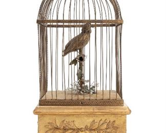 134
A Large Mechanical Bird Cage
Late-19th Century
The rectangular cage enclosing a singing bird seated on T-shaped branch with beaded flowers on a carved wood base with side turn key and play/stop lever
18.5" H x 9.75" W x 9.75" D
Estimate: $1,500 - $2,500