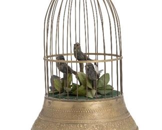 135
A Mechanical Bird Cage With Three Birds
Circa 1920s
The domed and gilded cage enclosing three singing birds with turn key bottom
11.5" H x 7.25" Dia.
Estimate: $500 - $700