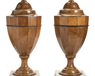 142
A Pair Of Georgian-Style Urn-Shaped Knife Boxes
Late-19th/early-20th Century
Each urn-shaped box with acorn finial handle standing on a footed pedestal
Each approximately: 23" H x 9" Dia.
Estimate: $800 - $1,200