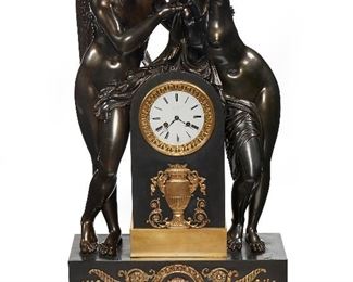 174
A French Paul Garnier Figural Bronze Mantle Clock
19th Century
Signed to dial: Paul Garnier H'er Du Roi; Stamped: Paul Garnier H'er Du Roi / Paris / 1478
The clock set in a bronze and gilt bronze scene of Cupid and Psyche
33" H x 20" W x 9.5" D
Estimate: $12,000 - $18,000