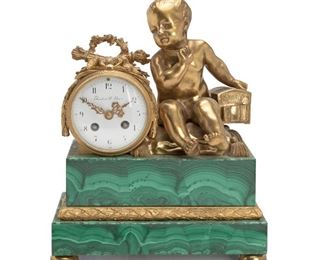177
A French Gilt Bronze And Malachite Mantle Clock
Early-20th Century
Stamped to movement: Medaille D'Or / Paris 1900 / Samuel Marti / 7188; Further signed to porcelain dial: Theodore B. Starr
Comprising porcelain dial clock clock surmounted by a bronze torch and arrow quiver beside a seated cupid on a green malachite base and bronze bun feet
13.25" H x 11" W x 6.375" D
Estimate: $3,000 - $5,000