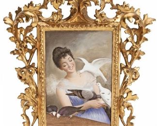 188
A Continental Porcelain Plaque Of A Lady
Late-19th/early-29th Century
The lady pictured with birds in an ornately carved giltwood frame
Overall: 20" H x 15.5" W x 3" D; Plaque: 10" H x 7.25" W
Estimate: $1,800 - $2,200