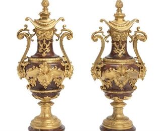 194
A Pair Of French Regency Rouge Marble And Bronze Urns
Fourth-quarter 19th Century; Paris, France
Each stamped to base: F. Barbedienne
Each urn with gilt bronze mounts and lid, 2 pieces
23.5" H x 10" W x 8.5" D
Estimate: $5,000 - $7,000