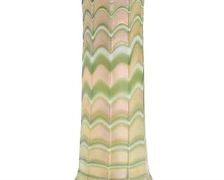 201
A Loetz-Style Iridescent Glass Vase
Late-19th/early-20th Century
The green and gold iridescent vase with wide rim
8.75" H x 3.5" Dia.
Estimate: $500 - $700