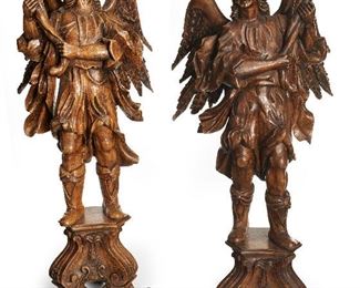 225
A Large Pair Of Carved Walnut Angel Torchieres
Late-19th/early-20th Century
The opposing pair of angel shaped torchieres each standing on a scrolled-tripod base, 2 pieces
Each approximately: 71" H x 30" W x 27" D
Estimate: $3,000 - $5,000