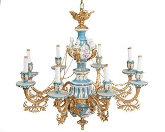 226
A Sevres-Style Gilt Bronze Chandelier
Late-19th/early-20th Century
The eight-light celeste blue porcelain chandelier dropping from an acanthus leaf top with gilt-bronze arms and mounts
27.5" H x 29" Dia.
Estimate: $1,000 - $2,000