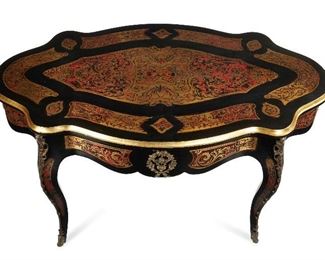 232
A Large Oval Boulle-Style Center Table
Circa 1900
The ornately-inlaid black, red, and gilt-painted boulle-style table on cabriole legs with bronze mounts
30" H x 55" W x 31.5" D
Estimate: $1,500 - $2,000