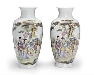 250
A Pair Of Chinese Hand Painted Vases
20th Century
Each with maker's mark to bottom
Each white porcelain baluster form vase with a painted figural scene
Each approximately: 17.5" H x 5.8" Dia.
Estimate: $500 - $700