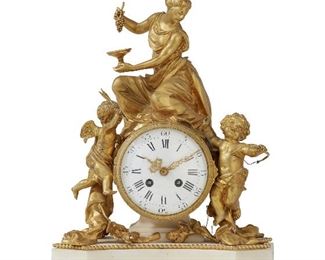 253
A French Figural Gilt-Bronze Table Clock
First-quarter 20th Century
Movement signed: Samuel Marti, Medaille D'or Paris 1900
Surmounted by a Maenad holding grapes flanked by putti over a clockface set with a white porcelain dial with Roman numeral hour markers and Arabic numeral sub-seconds over a white marble base raised on toupie feet
15.5" H x 11.25" W x 7.75" D
Estimate: $1,500 - $2,500