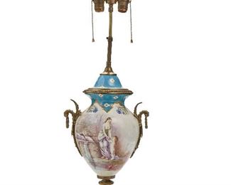 258
A Sèvres-Style Table Lamp
Late-19th Century
With Sevres-style mark to underside
Celeste blue and painted classical scenes on white porcelain body with bronze mounts
33" H x 11.5" W x 8.5" D
Estimate: $800 - $1,200