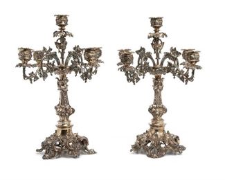 275
A Pair Of Silverplate Candelabra
20th Century
Apparently unmarked
Each five-light candelabra with grapevine motif and ornately footed bases, 2 pieces
Each approximately: 21.25" H x 17" W x 17" D
Estimate: $1,200 - $1,800
