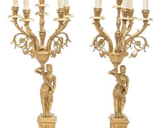 294
A Pair Of French Bronze Figural Candelabra
Late-19th/early-20th Century
Each six-light electrified candelabra with a bronze figure holding up scrolled arms on a plinth and marble base
Each approximately: 33" H x 12.25" Dia.
Estimate: $1,000 - $2,000