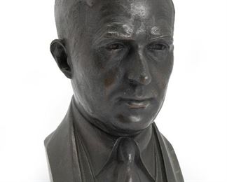 295
A Bronze Bust Of A Man
Early-20th century <br />
Indistinctly stamped for Tiffany, NY
The portrait bust of a man in suit and tie
11.5" H x 6.75" W x 7.75" D
Estimate: $800 - $1,200