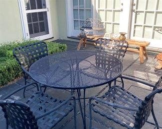 Wrought iron table with 4 Brown and Jordan chairs