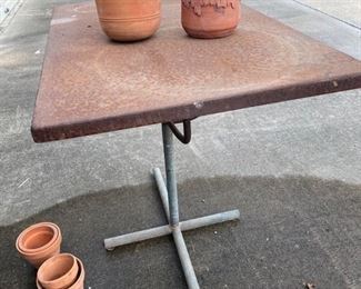 Metal outdoor table - clay pots