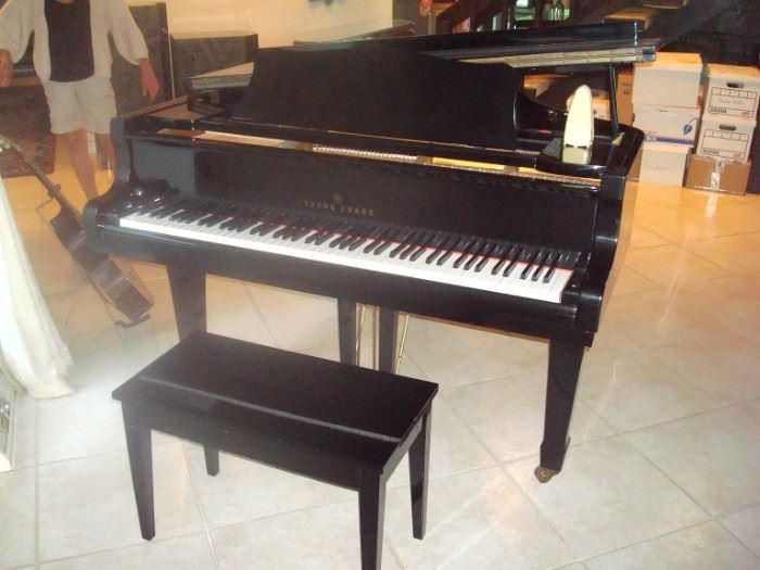 Young Chang G-183 polished ebony grand piano and bench.