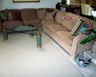 Quality sectional with glass top coffee table.
